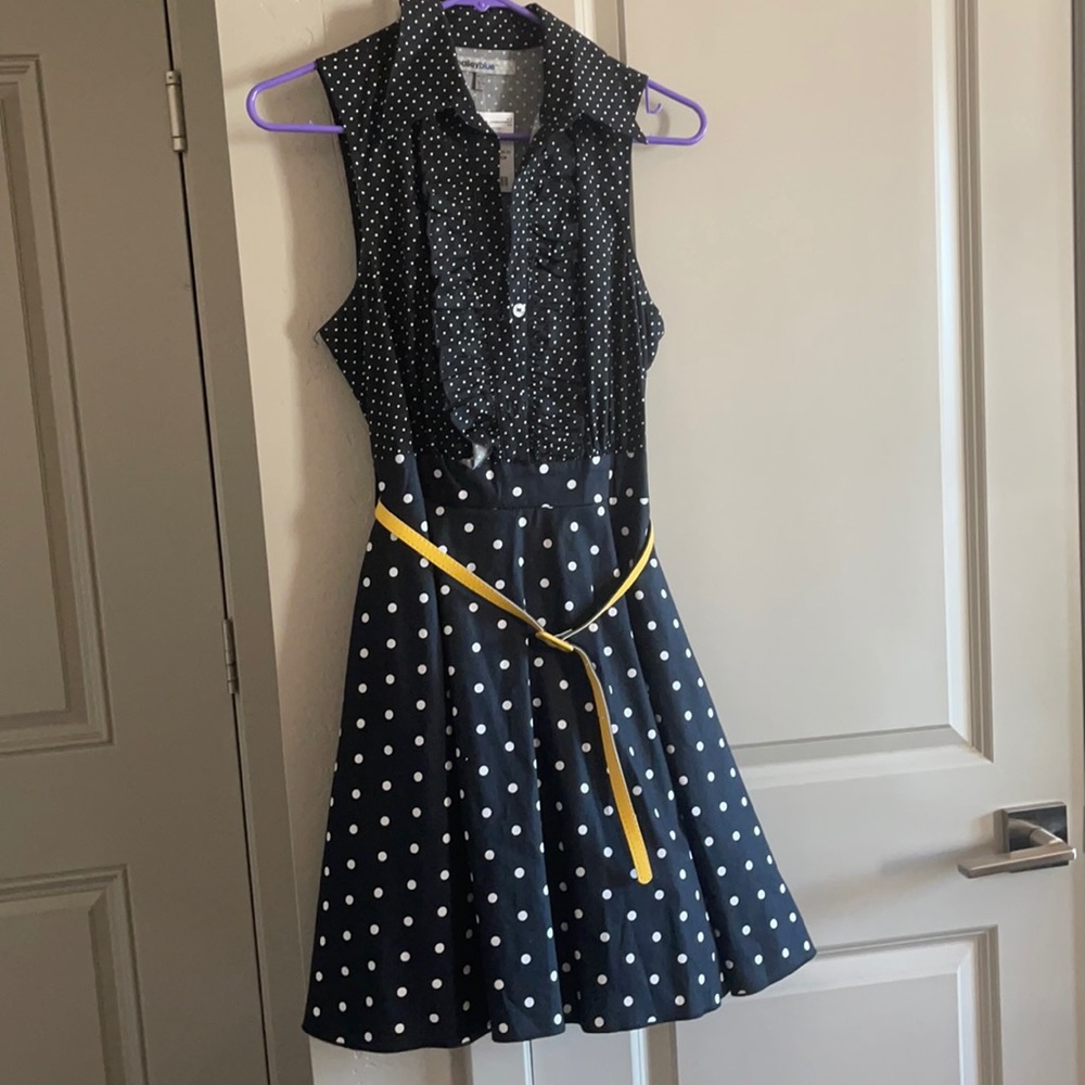 Black polka dot dress.